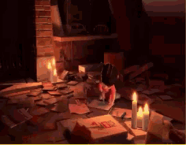 a box of pizza sits on a table with candles around it