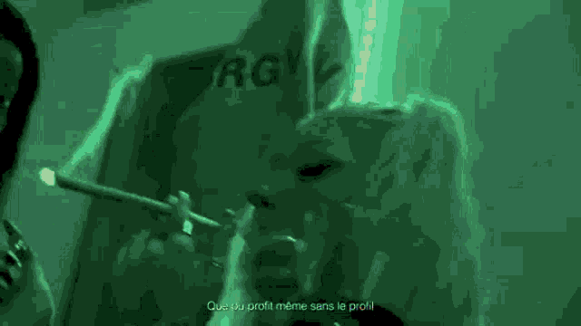a woman smoking a cigarette with a shirt that says " rg "