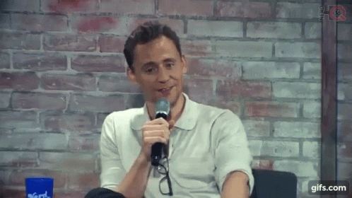 Tom Hiddleston Smile GIF - Tom Hiddleston Smile Content GIFs