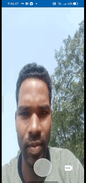 a man is taking a picture of himself on a phone