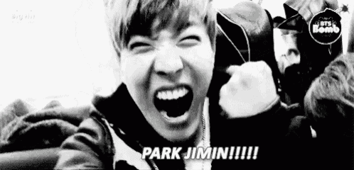 a black and white photo of a person with their mouth open and the words `` park jimin !!! '' .