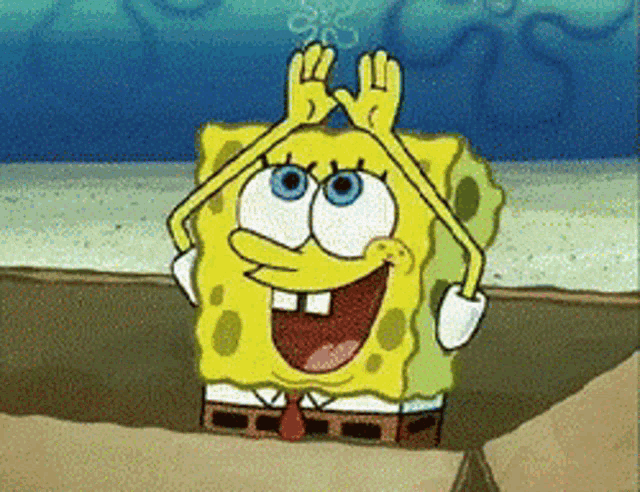 a cartoon of spongebob squarepants making a heart with his hands