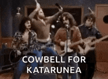 a group of men are playing guitars and singing into microphones in a band .