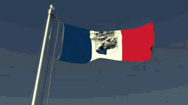 a red white and blue flag with a crest on it
