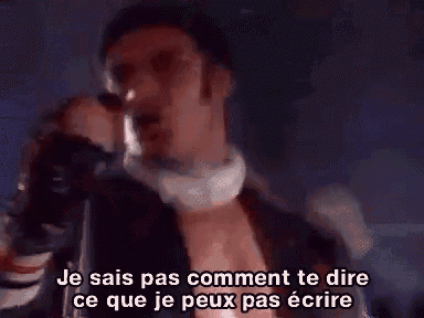 a man is singing into a microphone with the words je sais pas comment te dire ce que je peux pas ecrire