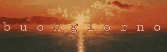a sunset over the ocean with the words buongiorno