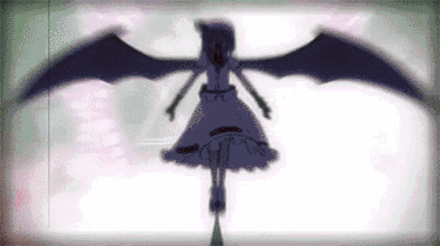 a silhouette of a girl in a dress with wings flying in the air .
