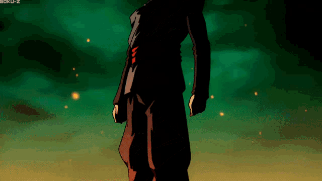 a man in a black suit stands in front of a green background that says boku-z on it