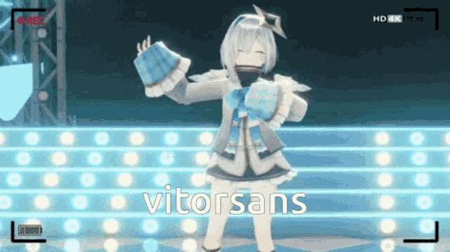 a video of a girl dancing with the words vitorsans written below her