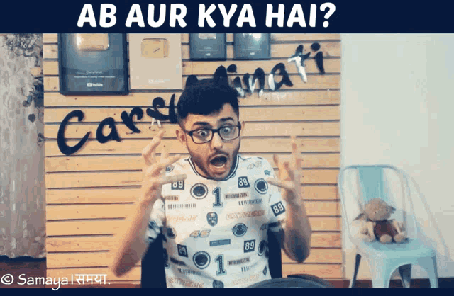 a man wearing glasses and a shirt that says ab aur kya hai on it