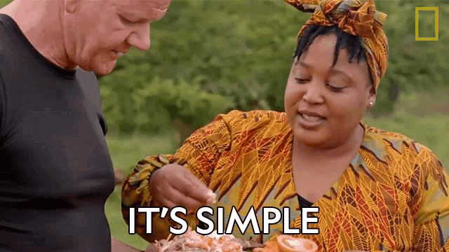 a man and a woman are looking at a plate of food and the woman is saying it 's simple