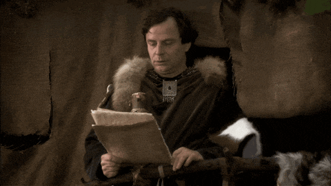 a man holding a piece of paper with the words ben vol discouzzzzars il est foal pourri on the bottom