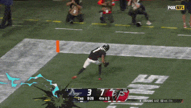 a football game between the falcons and the cowboys