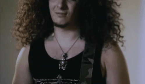 Rocker Rock And Roll GIF - Rocker Rock And Roll Curly Hair GIFs