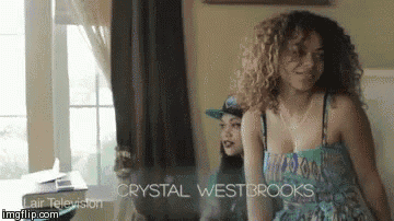two women are standing next to each other in a room with the name crystal westbrooks on the bottom
