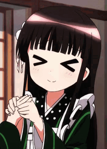 a girl with long black hair is smiling and making a funny face