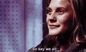a close up of a woman 's face with the words `` so say we all '' written below her .