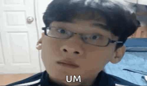 a man wearing glasses is making a funny face and says um .