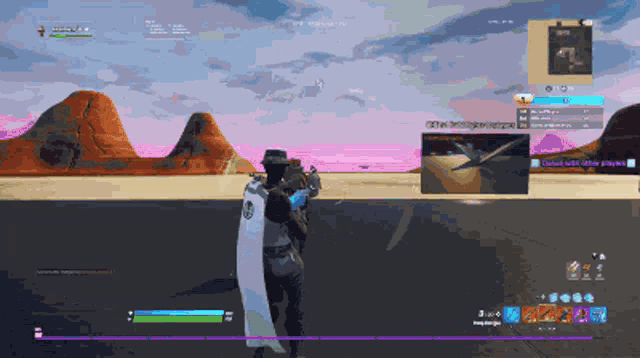 a screenshot of a video game shows a person holding a gun and a shield