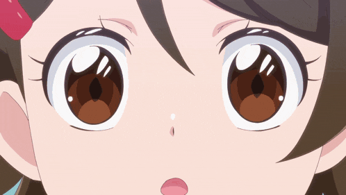 a close up of a girl 's face with pink hearts on her eyes