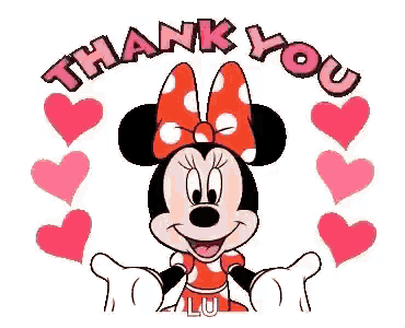 minnie mouse is wearing a red dress with polka dots and a bow and is surrounded by hearts .