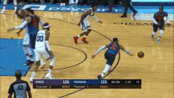 a basketball game is being played between the thunder and the kings