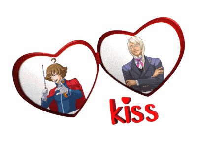 a couple of hearts with the word kiss on the bottom right
