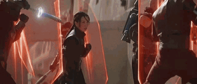 boba fett from star wars is standing in front of a building holding a sword .