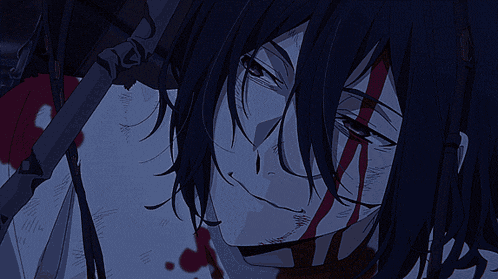a close up of a person 's face with blood on it