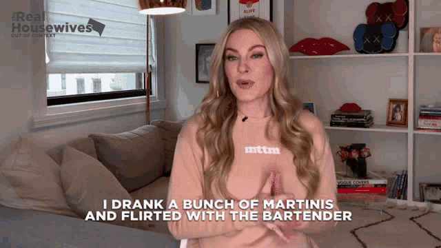 a woman in a sweatshirt that says mtm on it