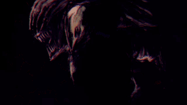 a man in a white shirt is standing in front of a monster in the dark