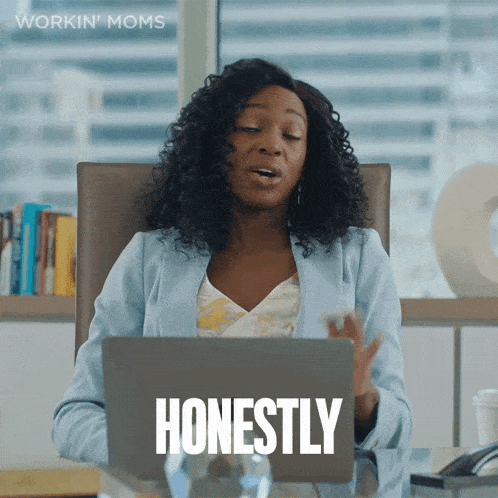 a woman sits at a desk with a laptop and the words honestly written on the screen