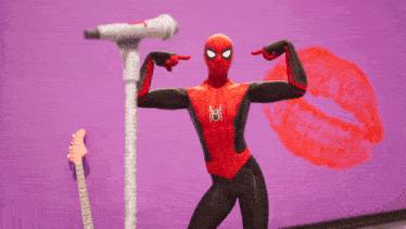 a spider man is flexing his muscles in front of a microphone and a guitar
