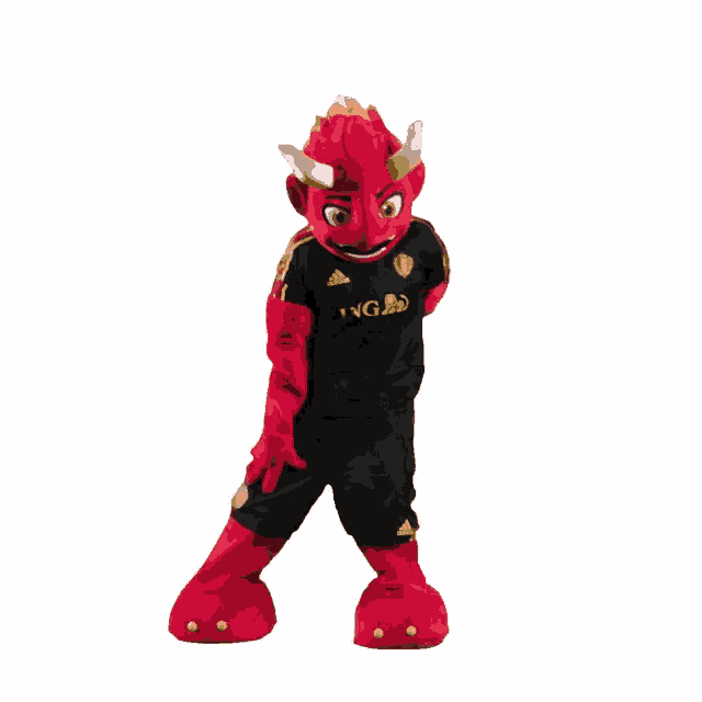 a red mascot wearing a black adidas shirt and black shorts