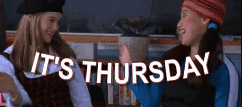 two girls giving each other a high five with the words it 's thursday in the background