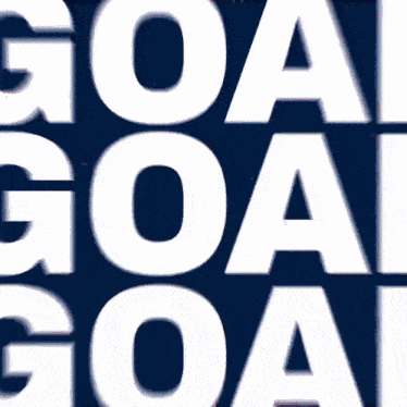a yellow light is shining on a sign that says " for goal "