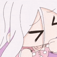 a close up of a girl 's face with her eyes closed and a controller in her hand .