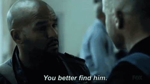 two men are talking to each other and one of them is saying you better find him .
