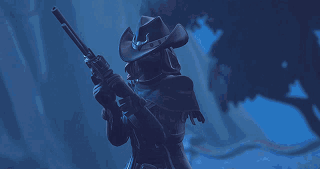 a woman in a cowboy hat holds a gun in her hand