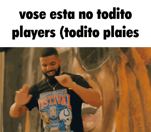 a man with a beard is dancing in front of a wall that says vose esta no todito players ( todito plaies