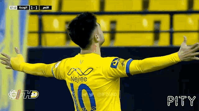 a soccer player wearing a jersey with the number 10 on it