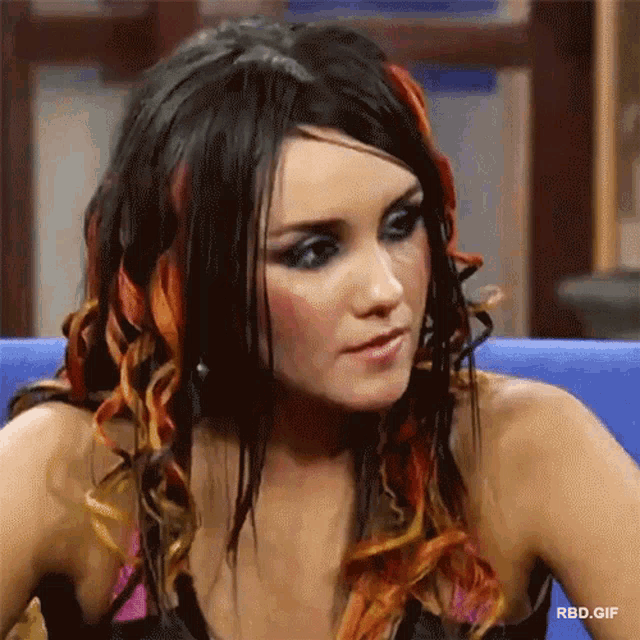 a close up of a woman 's face with rbd.gif at the bottom