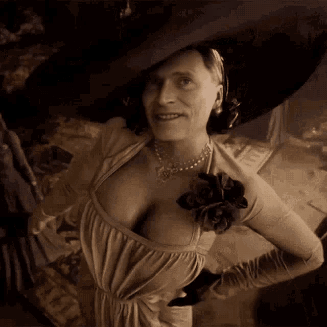 a woman is wearing a hat and a dress and has a flower on her chest .