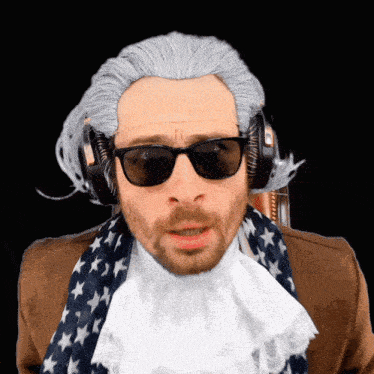 a man wearing a wig and sunglasses has headphones on his head