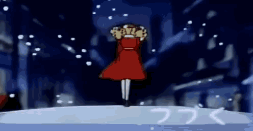 a girl in a red dress is standing in the snow holding a wreath