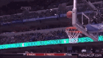 a basketball hoop with a sign that says lets go mavs on it