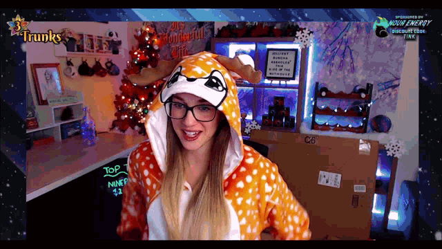 a woman in a reindeer costume is on a twitch channel