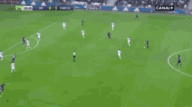 a soccer player wearing a fly emirates jersey is celebrating a goal during a game .