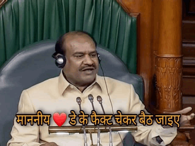 a man wearing headphones is giving a speech in a foreign language with a heart in the background