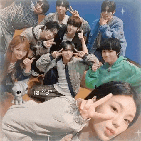 a group of young people are posing for a picture together .